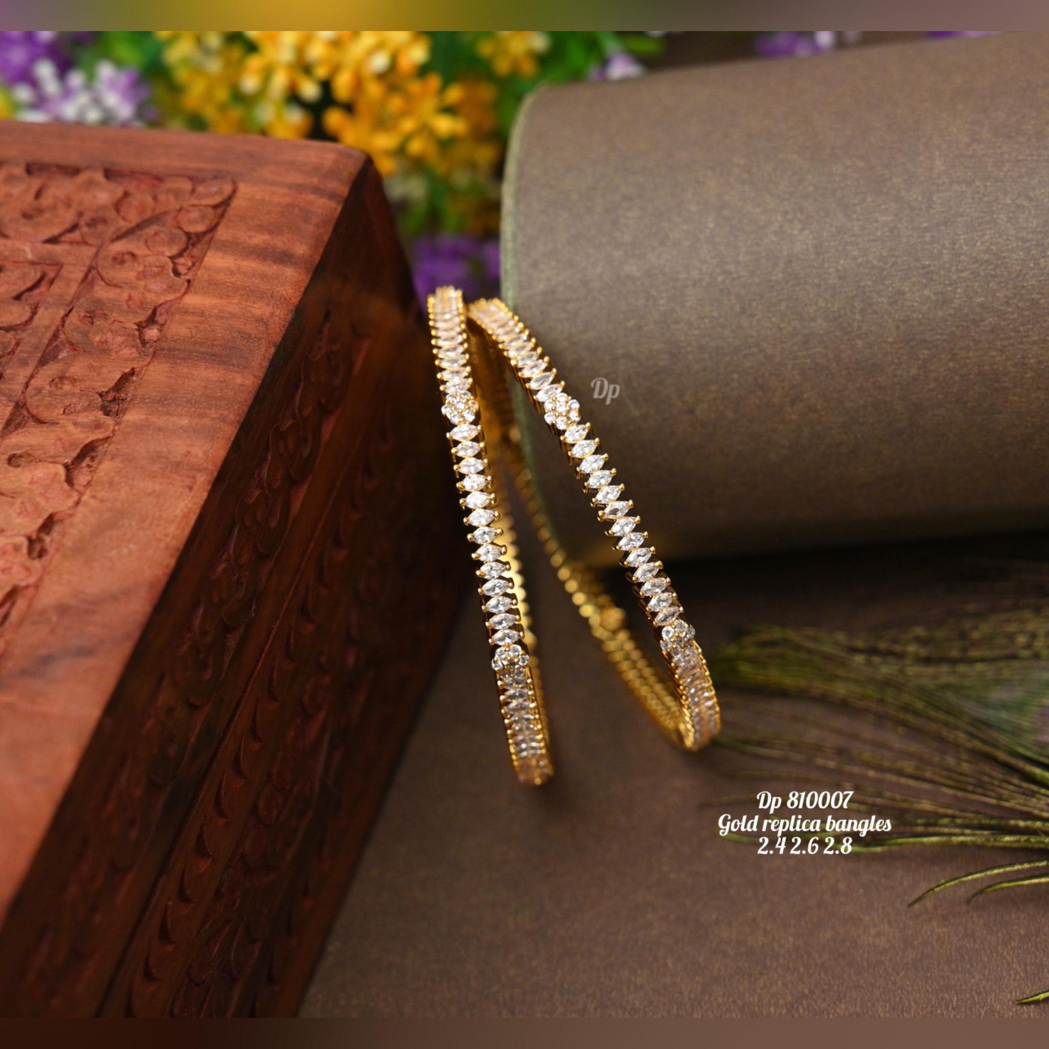 V816:Beautiful Gold Replica Bangles