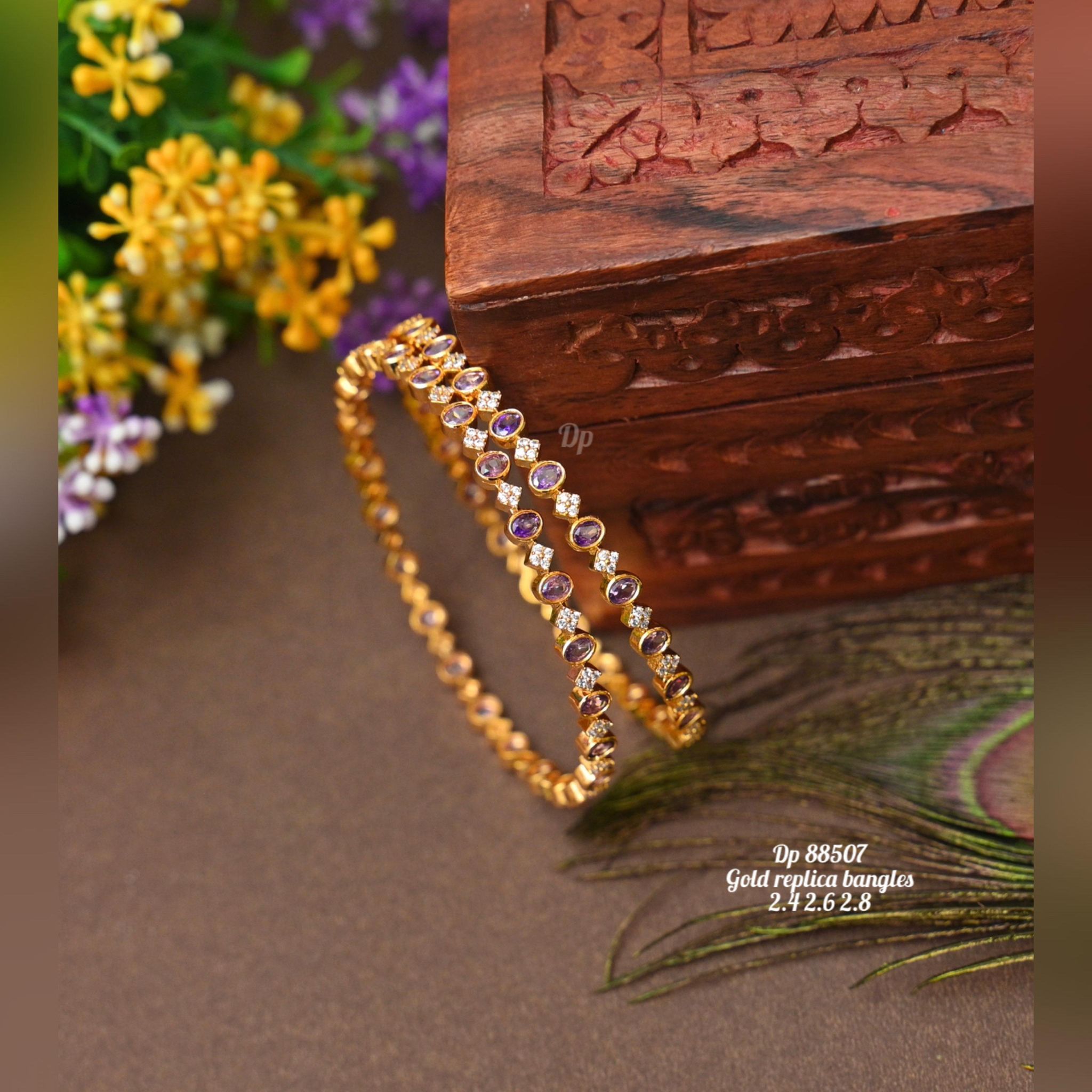 V819:Beautiful Gold Replica Bangles